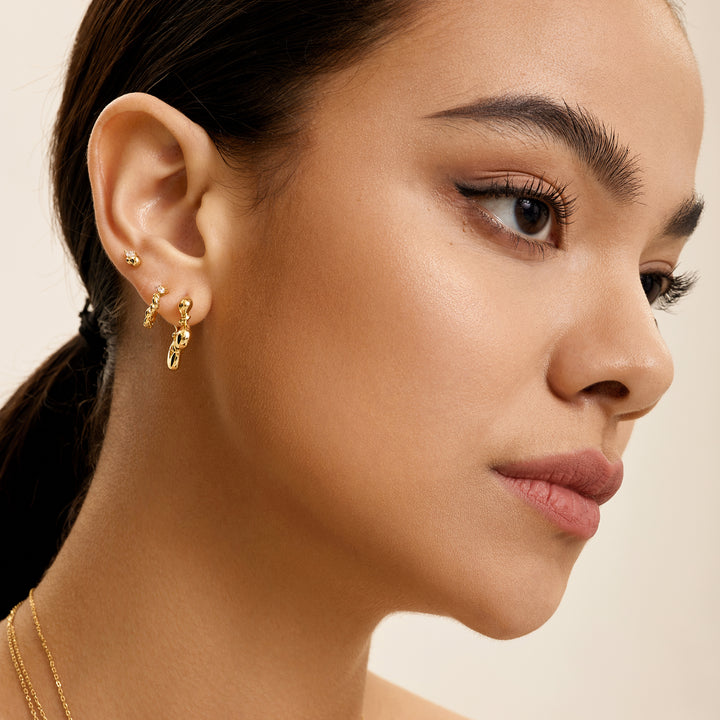 Gold Twisted Wave Hoop Earrings