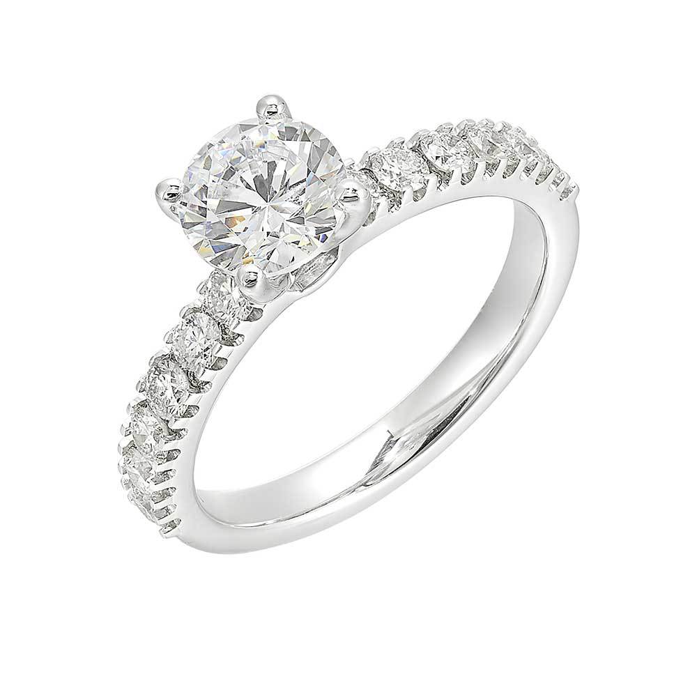 Solitaire with side diamonds,  combine the elegance of a solitaire with extra sparkle of diamond for a perfect classy choice.