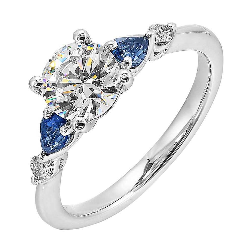 Colourful celebration! This five stone ring features round solitare diamonds followed by pear shape colorstone and a round diamond at the end,  offers a touch of color to your personality.