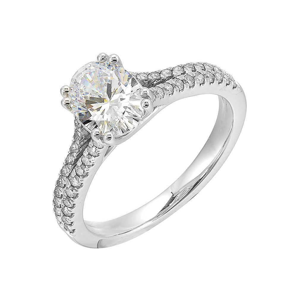 Sparkling solitaire steals the show with dual prongs holding the solitare,  elegantly framed by a two row pave split shank.