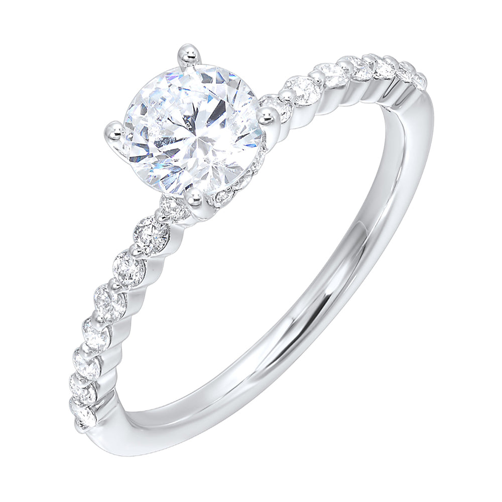 This lovely engagement ring consists of brilliant cut center diamond with single prong set diamonds along the shank and  finishing touches of added diamonds details in front.