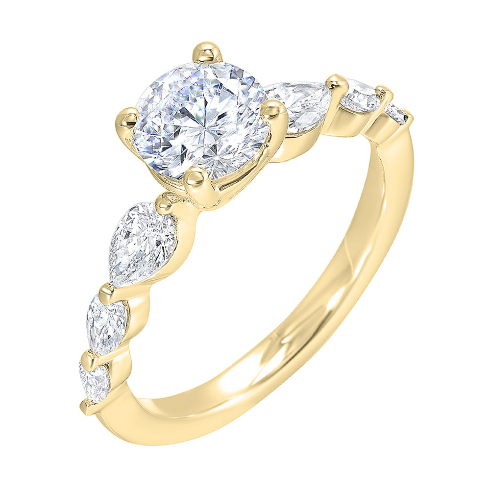 Round solitaire meets graduating pear cut diamonds set in common prongs blending classic elegance with contemporary style.