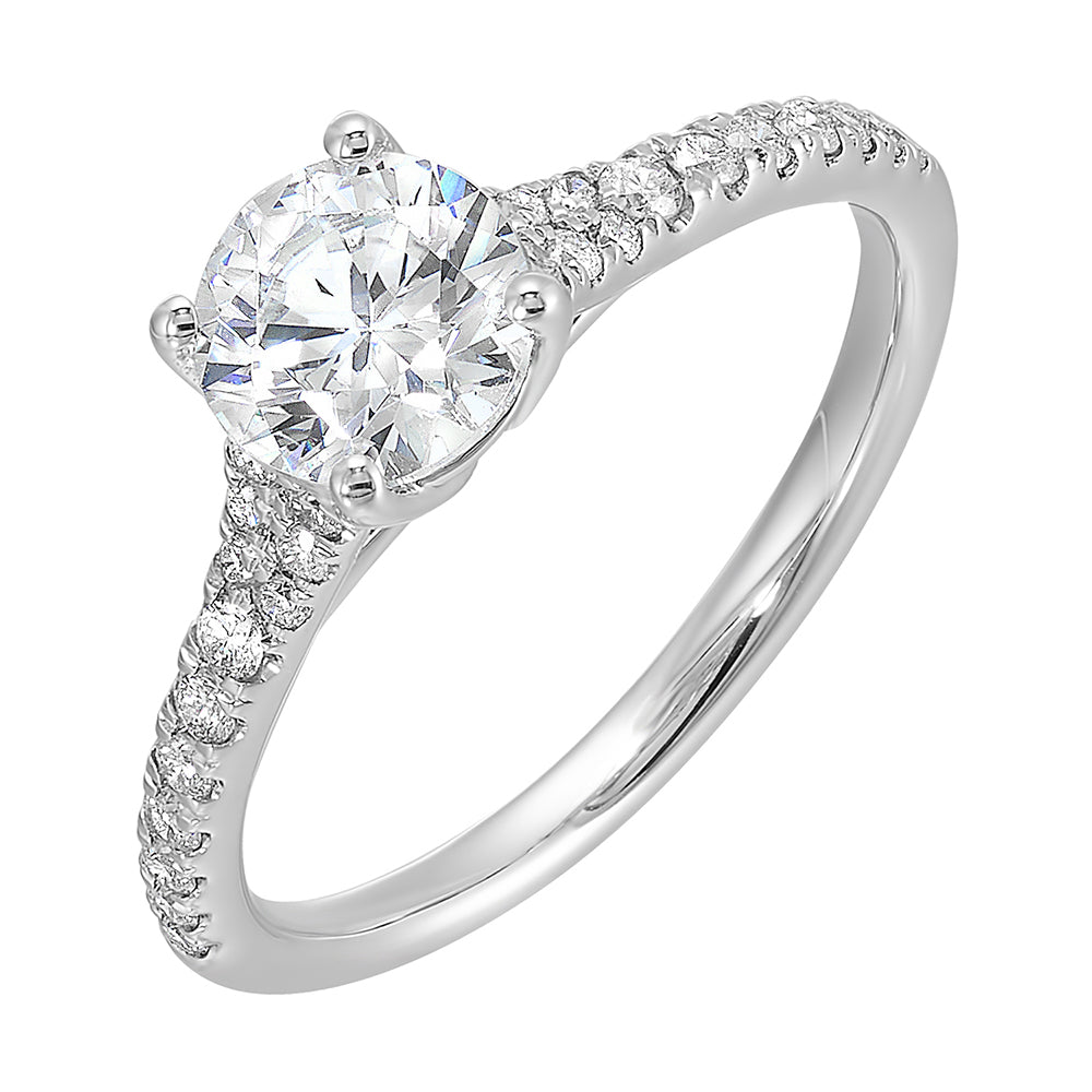 Defined by a tapered shank set with graduated round diamonds,  this classic solitaire engagement ring is a classy choice