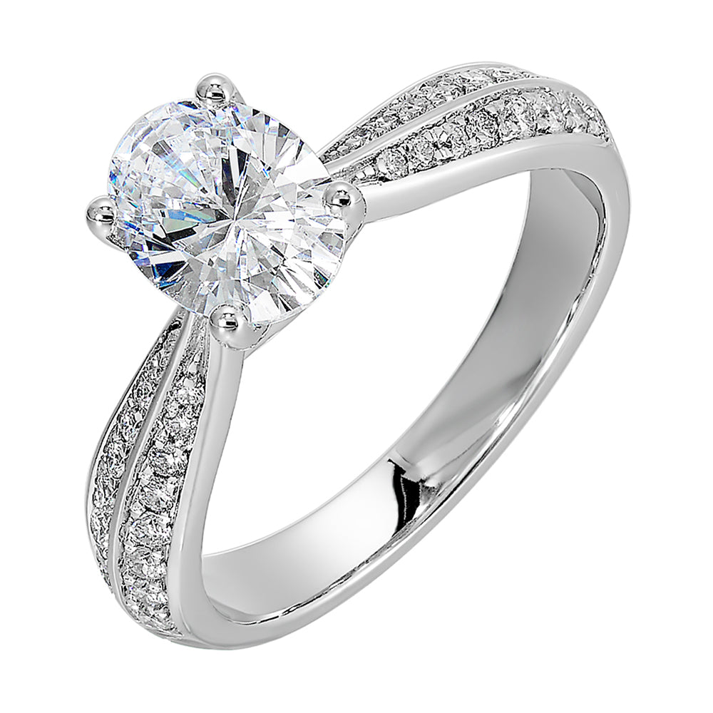 Pave set knife edge engagement ring with oval solitare creates an elegant look with minimalist appeal.