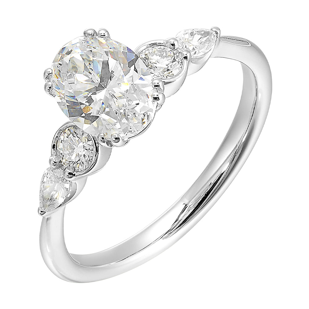 Classic five stone ring features round and pear diamonds that rest on either side of the round center diamond with a pinched shank for an elegant yet modern look.