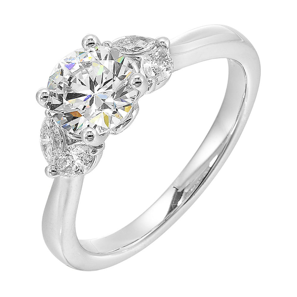 Create timeless romance with round solitare engagement ring held between symmetrical marquise petals.