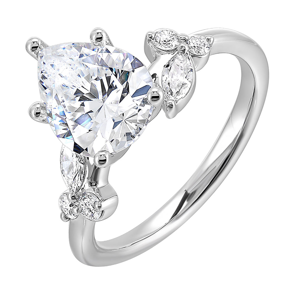 Timeless pear cut engagement ring features marquise and round diamonds placed randomly are perfect for her special day.